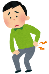 腰痛で腰をおさえる男性のイラスト